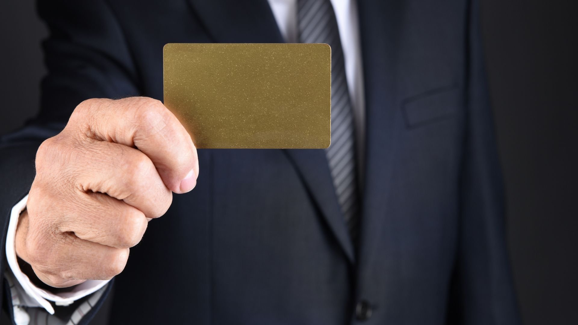 Man holds gold card